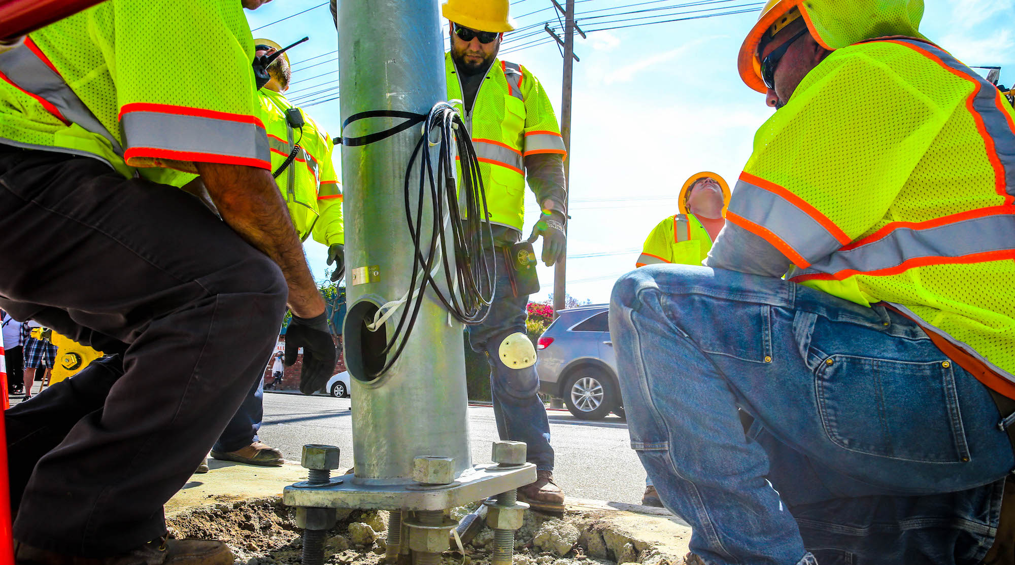 workers installing a post